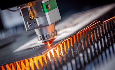 CNC Laser cutting of metal, modern industrial technology.