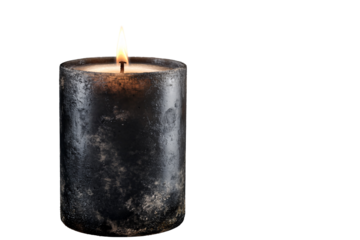 a black candle with a flame