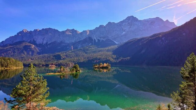 Autumn colors in fall at lake Eibsee. Alpine landscape with German Alps mountain Garmisch-Partenkirchen, Bavarian alps, Germany, Europe