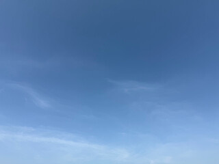 Sky is blue and clear with no clouds. clear blue sky with no clouds. sun is shining brightly.