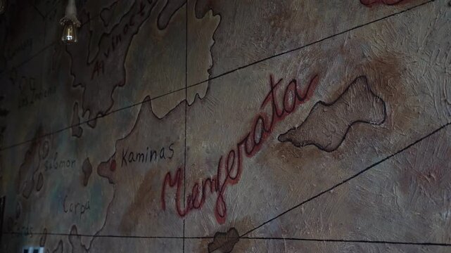 View of an ancient map on a wall, close up shot
