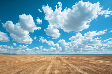 Fototapeta premium serene, clean empty job site under bright blue sky with fluffy clouds, creating peaceful atmosphere. Ideal for construction or design projects 