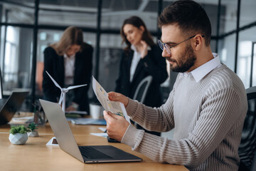 Fototapeta premium Professional employees. Business people are working in the office