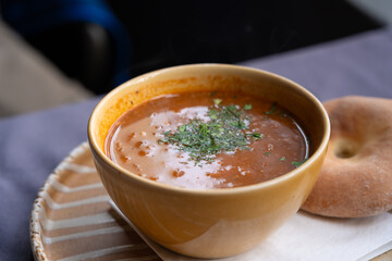 Spicy kharcho or harcho soup, traditional Georgian chowder. Creamy kharcho broth