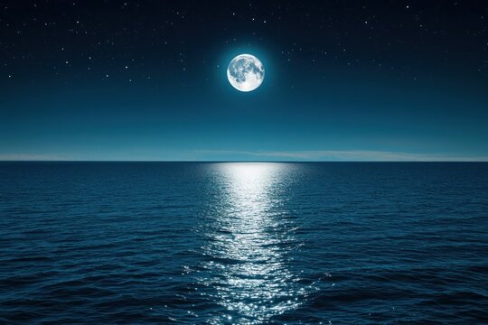 Full moon illuminates a dark ocean water surface at night with stars.