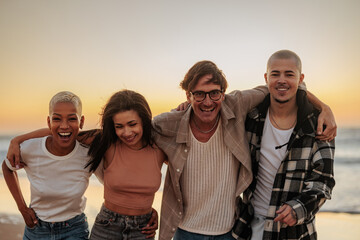 Friends walking together on beach at sunset, embracing friendship and summer vibes