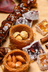 Sweet food Turkish delight on wooden background, assorted locum and candy for decorated backdrop