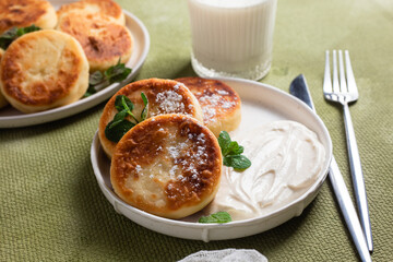 Homemade cottage cheese pancakes with sauce 
