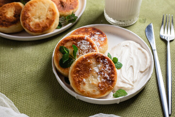 Homemade cottage cheese pancakes with sauce 