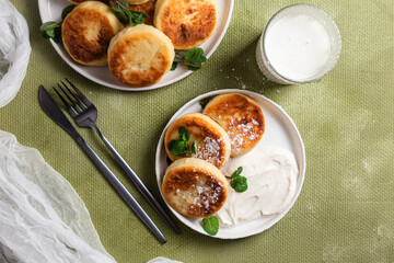 Homemade cottage cheese pancakes with sauce 