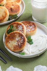 Homemade cottage cheese pancakes with sauce 