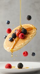 Floating Pancake with Fresh Berries and Syrup