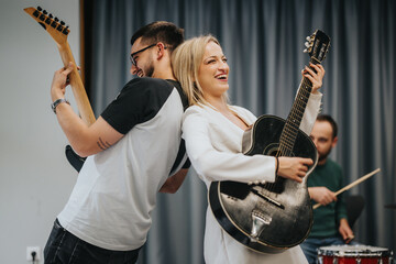 A group of musicians playing guitars and drums in a studio setting