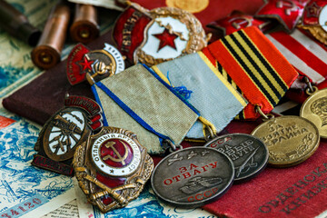 Awards of the Second world war close-up. Soviet military awards - Order Red Banner, Glory,the order...