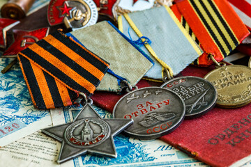 Awards of the Second world war close-up. Soviet military awards - Order Red Banner, Glory,the order...