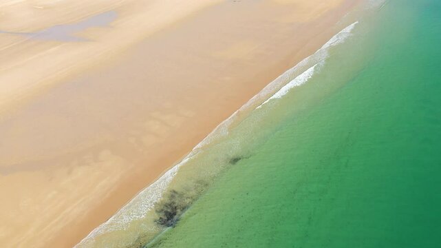 The English Channel peacefully borders the beach of Vieille eglise in Europe, France, Normandy, English Channel, in spring, on a sunny day.&nbsp;