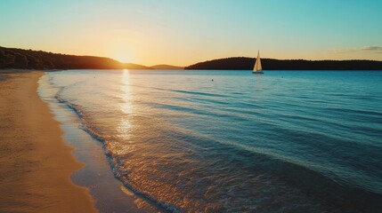 Obraz premium Tranquil Beach Sunset with Waves and Sailing Boats: Discover Nature's Scenic Coastal Beauty