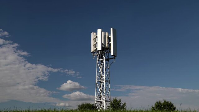 Cellular tower amidst clear blue sky and clouds in rural area. Telecommunication mast 5G