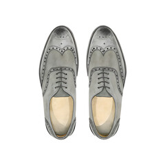 An overhead view of two gray laced dress shoes with decorative perforations on a transparent background.