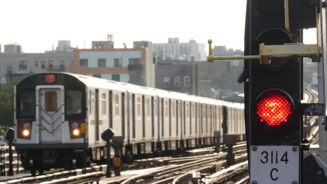 New York subway station. Metro train on metropolitan platform, United States public transportation. Elevated outdoor railway, 7 line. NYC passenger railroad traffic. Trainset locomotive, Queens USA.