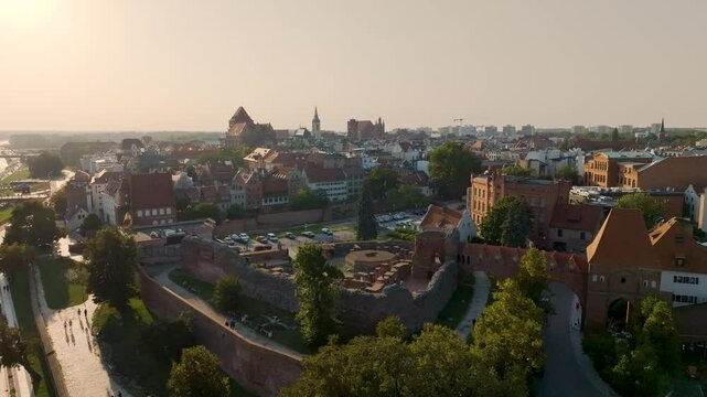 Aerial view of of the old town of Torun, the castle and the Vistula boulevard in Toruń, Poland