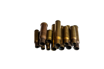 Empty cartridges of various calibers, after shooting, on the work table