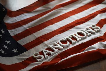 Sanctions - USA Flag with Bold Sanctions Text for Political and Economic Themes