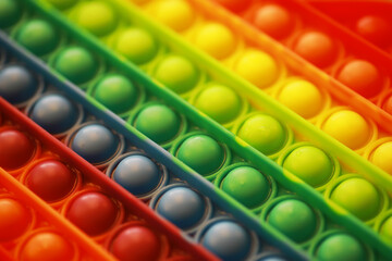 Colorful Rainbow Pop It Fidget Toy Background for Stress Relief and Fun Activities