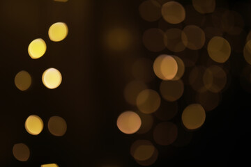 Abstract Golden Bokeh Lights Background: Warm and Soft Out-of-Focus Glow for Festive Decor