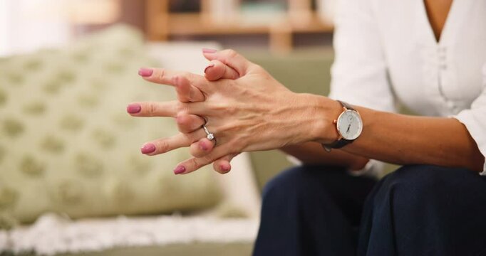 Anxiety, stress and hands of woman on sofa for psychology, mental heath and counseling session. Nervous, fear and depression with closeup of person in therapist office for mindset, help or evaluation