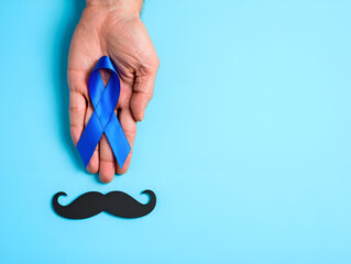 
Create 2 different styles of prompts to create pictures, all objects should be placed in one of the corners, create a prompt based on the hint "First person top view photo of male hand holding blue 