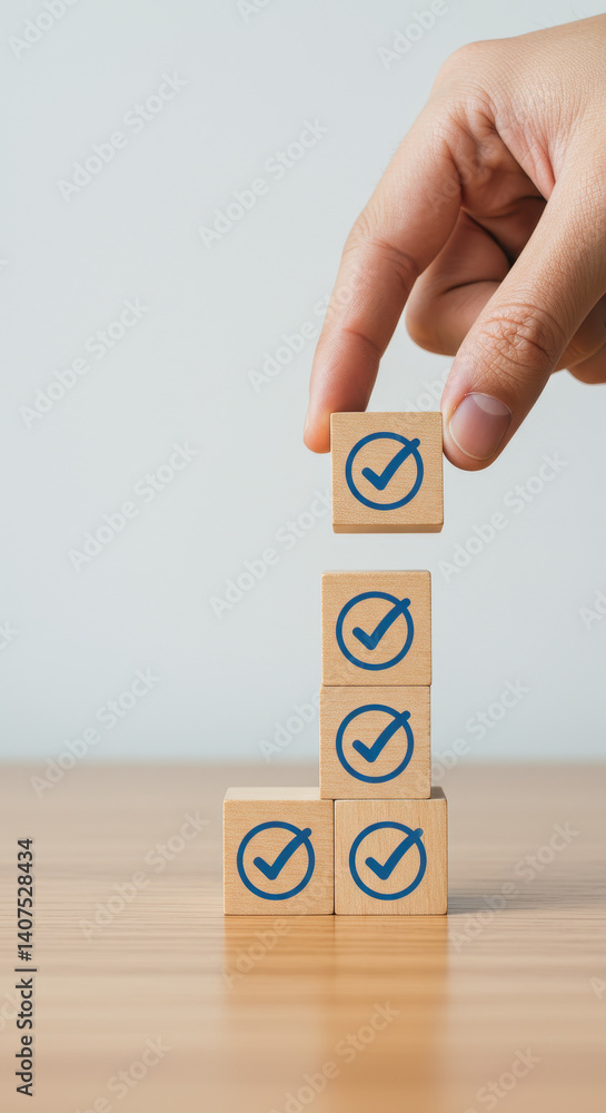 Poster checklist blocks: hand stacking wooden cubes with checkmarks for success, completion, and task manag