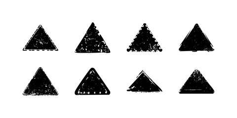 Black grunge shapes elements with scratches and abrasions. Triangle shape.