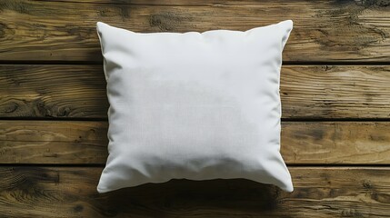 Obraz premium White Blank Square Pillow Mockup on Wooden Background, Top View