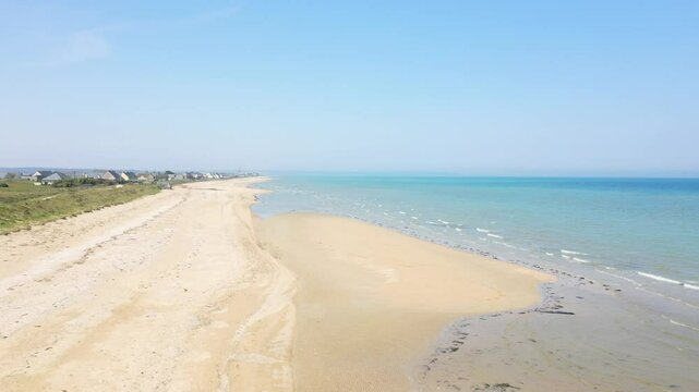 The soft sand of Utah Beach faces infinity in Europe, France, Normandy, near Carentan, in spring, on a sunny day.&nbsp;