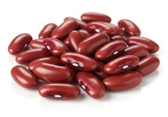 A pile of kidney beans isolated on a white background close up studio shot showing texture and shape