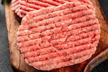 Meat cutlet raw pork beef meat dish organic fresh tasty gourmet food background on the table rustic food top view copy space