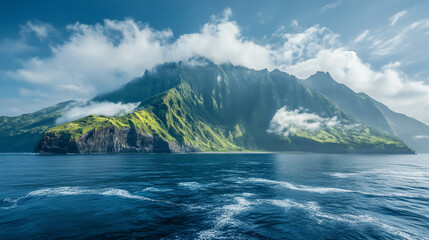 Majestic green mountain rises above calm ocean waters under a bright blue sky filled with fluffy white clouds in a serene coastal landscape