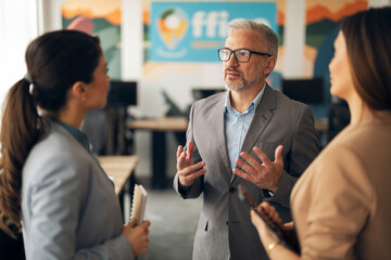 Business Team Discussing Strategy in a Modern Office Setting