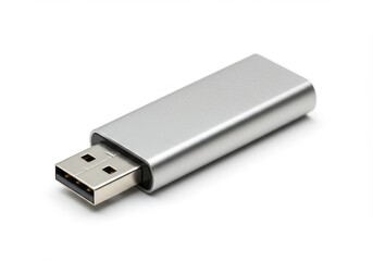 A close up view of a silver usb drive on a white background in a studio setting with soft lighting
