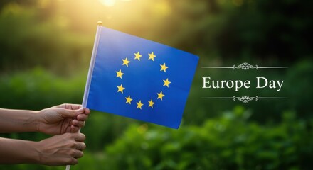 Person holding the European Union flag in celebration of Europe Day, symbolizing unity, peace, and shared European identity. Postcard