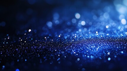 Blue Glow Particles in Abstract Gradient Lighting, Symbolizing Creativity and Innovation
