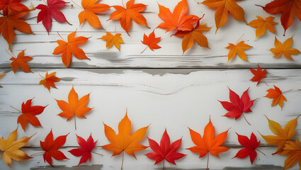 Autumnal Leaf Display: A vibrant arrangement of fallen maple leaves in various shades of red, orange, and yellow, artfully arranged on a weathered wooden surface, evoking the essence of fall. 