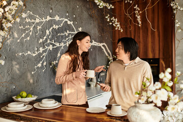 Couple joyfully preparing for their wedding in a cozy, floral decorated kitchen