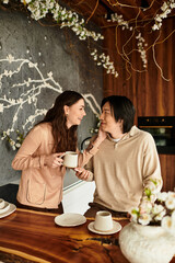 Couple joyfully sharing intimate moments while preparing for their wedding celebration together