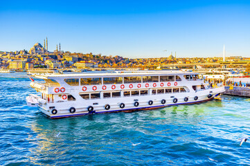 Passenger ferries at Karakoy pier next to Galata Bridge, Istanbul, Turkey