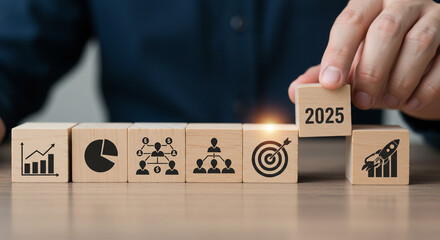 Planning 2025 goals business strategy growth teamwork and targets Wooden blocks with icons