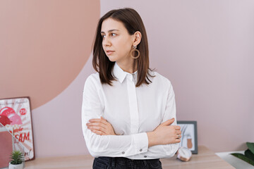 A professional corporate portrait of a confident businesswoman