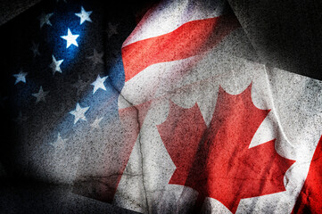 U.S.A. and Canada national flag on old and cracked background.