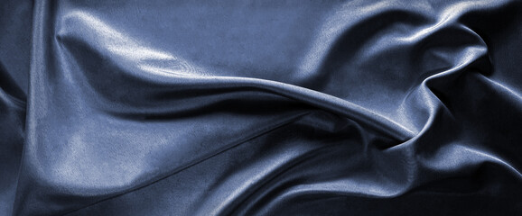 Fototapeta premium Dark blue silk satin fabric. Luxury elegant backgrand for design. Wave line crumpled. Wide banner. 